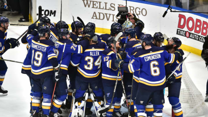 ST. LOUIS, MO - MAY 21: Blues players pour on to the ice to celebrate winning game six of the NHL Western Conference Final between the San Jose Sharks and the St. Louis Blues, on May 21, 2019, at Enterprise Center, St. Louis, Mo. (Photo by Keith Gillett/Icon Sportswire via Getty Images)