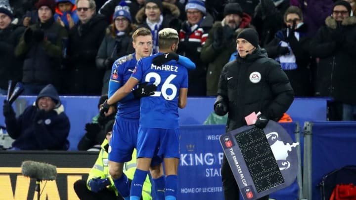 LEICESTER, ENGLAND - JANUARY 16: Riyad Mahrez of Leicester City is replaced by Jamie Vardy of Leicester City as a substitute during The Emirates FA Cup Third Round Replay match between Leicester City and Fleetwood Town at The King Power Stadium on January 16, 2018 in Leicester, England. (Photo by Julian Finney/Getty Images )