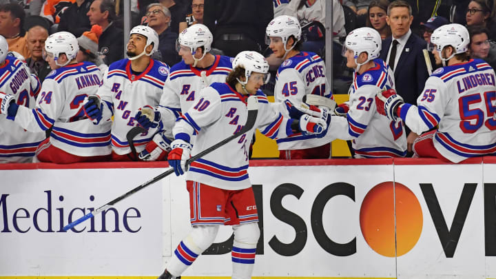 Apr 13, 2022; Philadelphia, Pennsylvania, USA; New York Rangers left wing Artemi Panarin (10) celebrates his goal with teammates against the Philadelphia Flyers during the second period at Wells Fargo Center. Mandatory Credit: Eric Hartline-USA TODAY Sports
