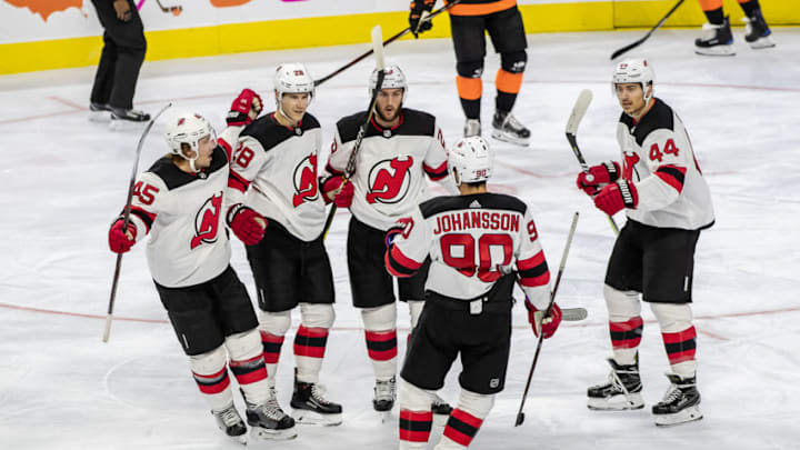 PHILADELPHIA, PA - OCTOBER 20: New Jersey Devils Marcus Johansson (90), Sami Vatanen (45), Blake Coleman (20) and Miles Wood (44) congratulate Damon Severson (28) after his goal during a game between the Philadelphia Flyers and the New Jersey Devils on October 20, 2018 at the Wells Fargo Center in Philadelphia, PA. (Photo by John McCreary/Icon Sportswire via Getty Images)