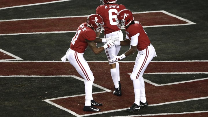 SANTA CLARA, CALIFORNIA – JANUARY 07: Jerry Jeudy #4 of the Alabama Crimson Tide celebrates his 62 yard touchdown reception thrown by Tua Tagovailoa #13 against the Clemson Tigers during the first quarter in the College Football Playoff National Championship at Levi’s Stadium on January 07, 2019 in Santa Clara, California. (Photo by Lachlan Cunningham/Getty Images)