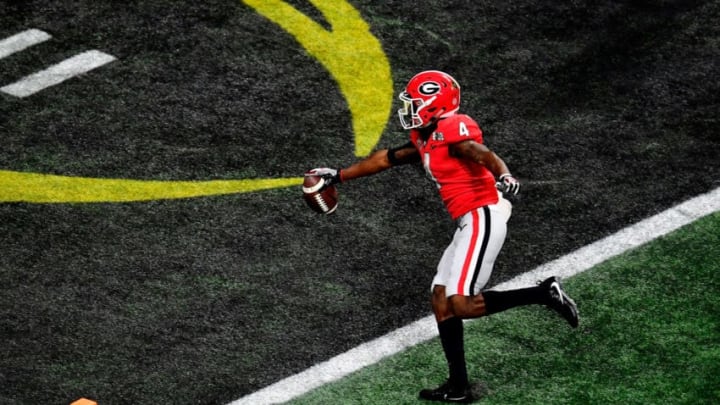 ATLANTA, GA - JANUARY 08: Mecole Hardman #4 of the Georgia Bulldogs runs one yard for a touchdown during the second quarter against the Alabama Crimson Tide in the CFP National Championship presented by AT&T at Mercedes-Benz Stadium on January 8, 2018 in Atlanta, Georgia. (Photo by Scott Cunningham/Getty Images)