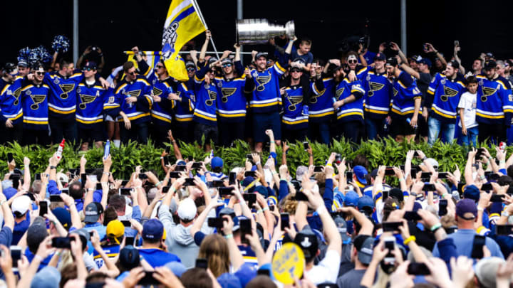 ST. LOUIS, MO - JUNE 15: St. Louis Blues' Alex Pietrangelo, center, hoists the Stanley Cup in front of his team and fans during the St. Louis Blues Victory Pep Rally on June 15, 2019, in Downtown St. Louis, MO. (Photo by Tim Spyers/Icon Sportswire via Getty Images)