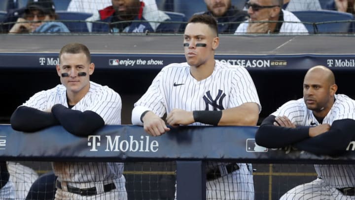 NEW YORK, NEW YORK - OCTOBER 14: (NEW YORK DAILIES OUT) (L-R) Anthony Rizzo #48, Aaron Judge #99 and Aaron Hicks #31 of the New York Yankees look on against the Cleveland Guardians during game two of the American League Division Series at Yankee Stadium on October 14, 2022 in New York, New York. The Guardians defeated the Yankees 4-2 in ten innings. (Photo by Jim McIsaac/Getty Images)