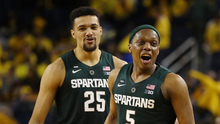 ANN ARBOR, MICHIGAN – FEBRUARY 24: Cassius Winston #5 and Kenny Goins #25 of the Michigan State Spartans react after a 77-70 win over the Michigan Wolverines at Crisler Arena on February 24, 2019 in Ann Arbor, Michigan. (Photo by Gregory Shamus/Getty Images)