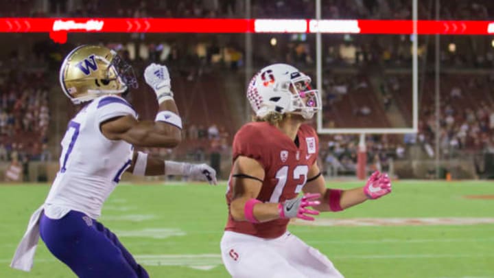 PALO ALTO, CA – OCTOBER 5: Simi Fehoko #13 of the Stanford Cardinal and Keith Taylor #13 of the Washington Huskies play in a Pac-12 game on October 5, 2019 at Stanford Stadium in Palo Alto, California. (Photo by David Madison/Getty Images)