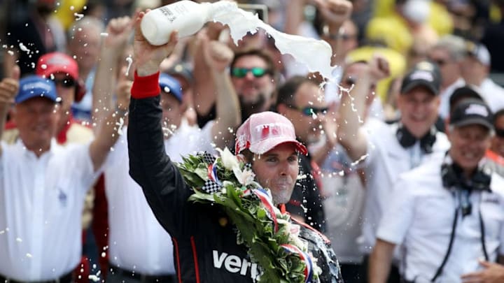 INDIANAPOLIS, IN - MAY 27: Will Power of Australia, driver of the #12 Verizon Team Penske Chevrolet celebrates by drinking milk after winning the 102nd Running of the Indianapolis 500 at Indianapolis Motorspeedway on May 27, 2018 in Indianapolis, Indiana. (Photo by Chris Graythen/Getty Images)