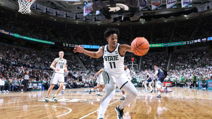 EAST LANSING, MI – NOVEMBER 18: A.J. Hoggard #11 of the Michigan State Spartans grabs a loose ball during the second half against the Villanova Wildcats at Breslin Center on November 18, 2022 in East Lansing, Michigan. (Photo by Rey Del Rio/Getty Images)