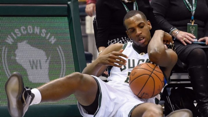 Mar 4, 2016; Milwaukee, WI, USA; Milwaukee Bucks guard Khris Middleton (22) checks his elbow after fallin in the fourth quarter during the game against the Minnesota Timberwolves at BMO Harris Bradley Center. The Bucks beat the Timberwolves 116-10. Mandatory Credit: Benny Sieu-USA TODAY Sports