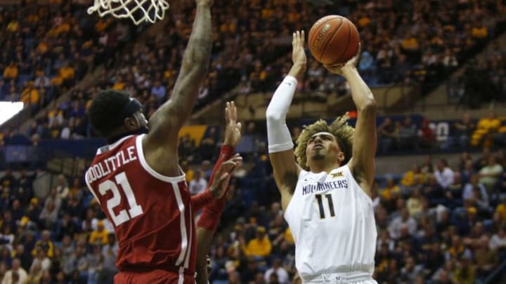 MORGANTOWN, WV - FEBRUARY 29: Emmitt Matthews Jr. #11 of the West Virginia Mountaineers drives the rim against the Oklahoma Sooners at the WVU Coliseum on February 29, 2020 in Morgantown, West Virginia. (Photo by Justin K. Aller/Getty Images)