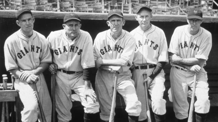 NEW YORK – OCTOBER, 1933. A group of National League champion New York Giants pose for a photo in the Polo Grounds before the start of the World Series in October, 1930. Mell Ott is far left, and Lefty O’Doul is far right. (Photo by Mark Rucker/Transcendental Graphics, Getty Images)