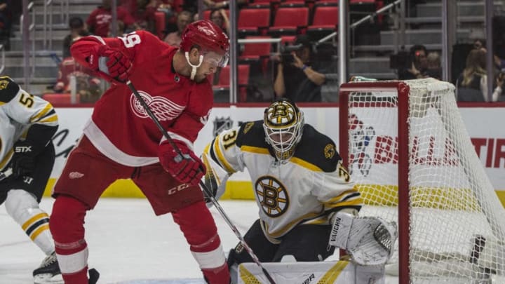 DETROIT, MI - SEPTEMBER 23: Detroit Red Wings forward Anthony Mantha (39) tries to get the puck past Boston Bruins goaltender Zane McIntyre (31) in the first period of the Boston Bruins at Detroit Red Wings pre-season NHL hockey game on September 23, 2017 at Little Caesars Arena, in Detroit, MI. (Photo by Tony Ding/Icon Sportswire via Getty Images)