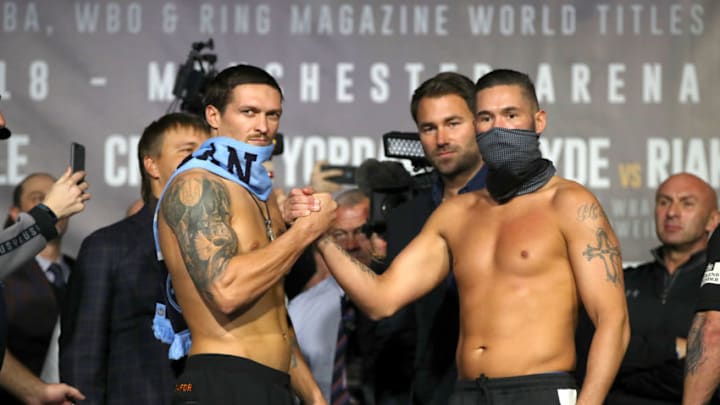 Oleksandr Usyk (left) and Tony Bellew during the weigh in at Manchester Central. (Photo by Nick Potts/PA Images via Getty Images)