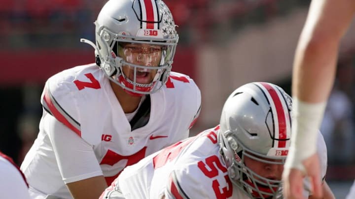 Ohio State Buckeyes quarterback C.J. Stroud (7) calls a play behind Ohio State Buckeyes offensive lineman Luke Wypler (53) during Saturday's NCAA Division I football game against the Nebraska Cornhuskers at Memorial Stadium in Lincoln, Neb., on November 6, 2021.Osu21neb Bjp 603