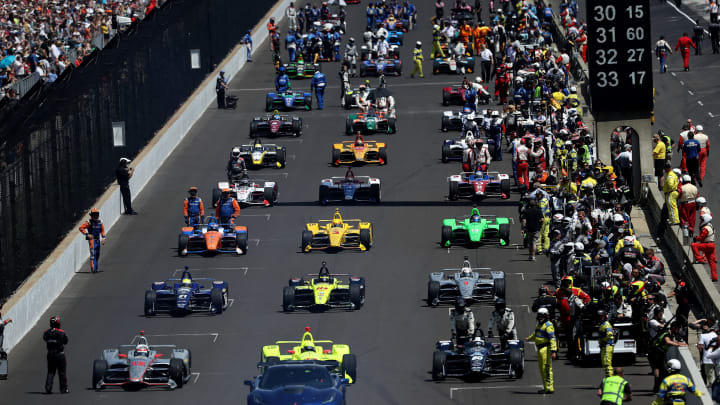 INDIANAPOLIS, IN – MAY 27: Cars start their engines during the 102nd Indianapolis 500 (Photo by Patrick Smith/Getty Images)
