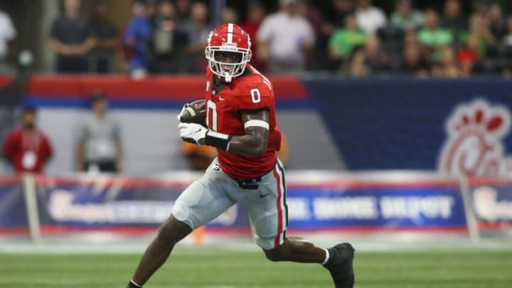 Sep 3, 2022; Atlanta, Georgia, USA; Georgia Bulldogs tight end Darnell Washington (0) runs after a catch against the Oregon Ducks in the second quarter at Mercedes-Benz Stadium. Mandatory Credit: Brett Davis-USA TODAY Sports