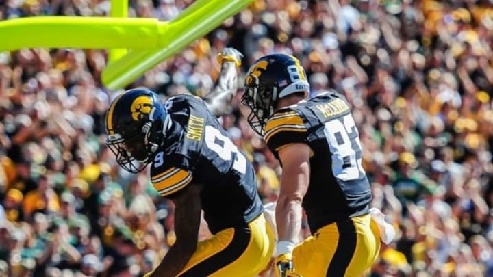 Sep 17, 2016; Iowa City, IA, USA; Iowa Hawkeyes wide receiver Riley McCarron (83) and wide receiver Jerminic Smith (9) celebrate after a touchdown during the second quarter against the North Dakota State Bison at Kinnick Stadium. Mandatory Credit: Jeffrey Becker-USA TODAY Sports