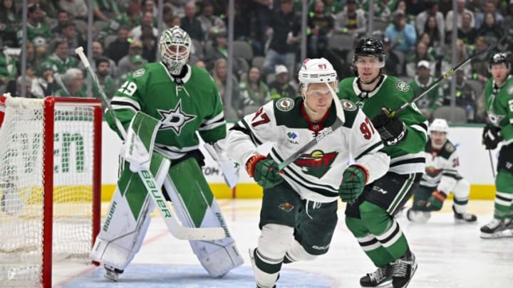 Apr 25, 2023; Dallas, Texas, USA; Dallas Stars goaltender Jake Oettinger (29) and defenseman Miro Heiskanen (4) and Minnesota Wild left wing Kirill Kaprizov (97) look for puck in the Stars zone during the third period in game five of the first round of the 2023 Stanley Cup Playoffs at American Airlines Center. Mandatory Credit: Jerome Miron-USA TODAY Sports