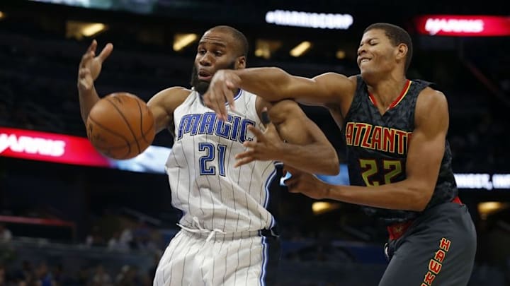 Oct 16, 2016; Orlando, FL, USA; Atlanta Hawks center Walter Tavares (22) and Orlando Magic forward Arinze Onuaku (21) battle for a rebound during the second half at Amway Center. The Hawks won 105-98. Mandatory Credit: Kim Klement-USA TODAY Sports