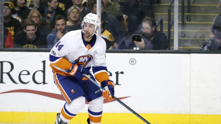 BOSTON, MA - DECEMBER 09: New York Islanders defenseman Calvin De Haan (44) looks to pass during a game between the Boston Bruins and the New York Islanders on December 9, 2017, at TD Garden in Boston, Massachusetts, The Bruins defeated the Islanders 3-1. (Photo by Fred Kfoury III/Icon Sportswire via Getty Images)