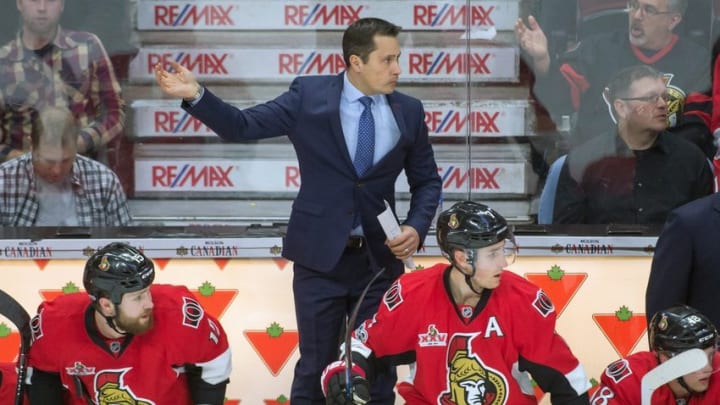Jan 7, 2017; Ottawa, Ontario, CAN; Ottawa Senators head coach Guy Boucher calls in the goalie in the last minute of play of the third period against the Washington Capitals at the Canadian Tire Centre. The Capitals defeated the Senators 1-0. Mandatory Credit: Marc DesRosiers-USA TODAY Sports