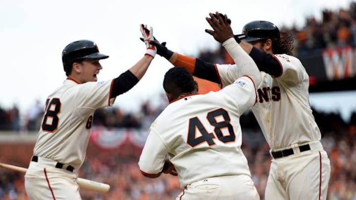SAN FRANCISCO, CA - OCTOBER 14: (R-L) Brandon Crawford