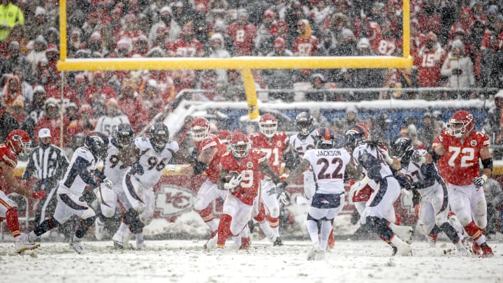 Spencer Ware #39 of the Kansas City Chiefs ran the football during the third quarter in the snow against the Denver Broncos at Arrowhead Stadium on December 15, 2019 in Kansas City, Missouri. (Photo by David Eulitt/Getty Images)