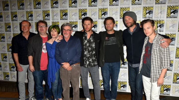 SAN DIEGO, CA – JULY 22: (L-R) Brad Buckner, Andrew Dabb, Eugenie Ross-Leming, Robert Singer, Jensen Ackles, Misha Collins, Jared Padalecki, and Alexander Calvert attend the “Supernatural” press line during Comic-Con International 2018 at Hilton Bayfront on July 22, 2018 in San Diego, California. (Photo by Jerod Harris/Getty Images)