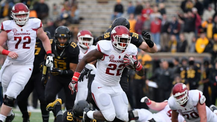 COLUMBIA, MO - NOVEMBER 25: Running back Rawleigh Williams III No. 22 of the Arkansas Razorbacks rushes against the Missouri Tigers at Memorial Stadium on November 25, 2016 in Columbia, Missouri. (Photo by Ed Zurga/Getty Images)