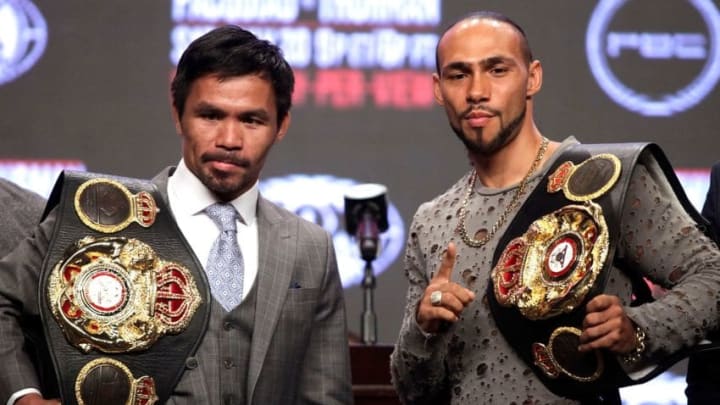 Philippine boxer Manny Pacquiao (L) and US boxer Keith Thurman pose as they hold their final press conference at the MGM Grand Hotel & Casino on July 17, 2019 in Las Vegas, Nevada, ahead of their July 20th WBA welterweight fight. - Keith Thurman vowed to retire Philippine boxing legend Manny Pacquiao as the two fighters traded verbal jabs ahead of the World Boxing Association battle for welterweight supremacy. (Photo by John GURZINSKI / AFP) (Photo credit should read JOHN GURZINSKI/AFP/Getty Images)