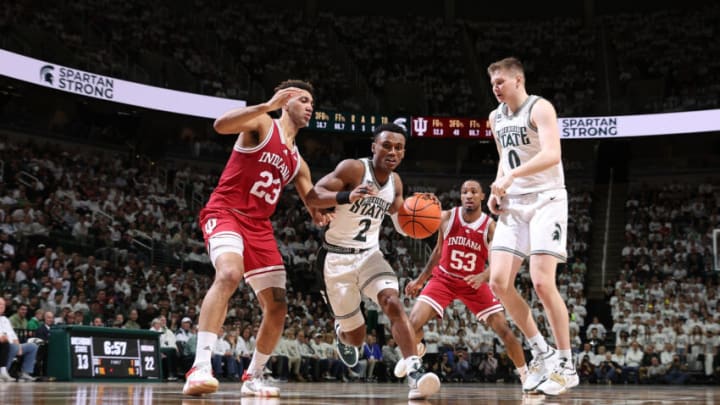 EAST LANSING, MI - FEBRUARY 21: Tyson Walker #2 of the Michigan State Spartans drives past Trayce Jackson-Davis #23 of the Indiana Hoosiers during the first half of the game at Breslin Center on February 21, 2023 in East Lansing, Michigan. (Photo by Rey Del Rio/Getty Images)