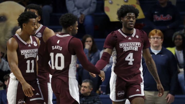 Feb 18, 2023; Oxford, Mississippi, USA; Mississippi State Bulldogs guard Dashawn Davis (10) reacts with guard/forward Cameron Matthews (4) during the second half at The Sandy and John Black Pavilion at Ole Miss. Mandatory Credit: Petre Thomas-USA TODAY Sports