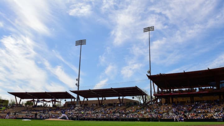 GLENDALE, AZ - MARCH 01: A general view as Scott Alexander #75 of the Los Angeles Dodgers delivers a pitch against the Cleveland Indians in the spring training game at Camelback Ranch on March 1, 2018 in Glendale, Arizona. (Photo by Jennifer Stewart/Getty Images)