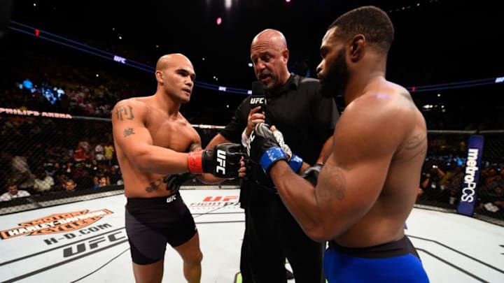 ATLANTA, GA - JULY 30: (L-R) Robbie Lawler and Tyron Woodley touch gloves in their welterweight championship bout during the UFC 201 event on July 30, 2016 at Philips Arena in Atlanta, Georgia. (Photo by Jeff Bottari/Zuffa LLC/Zuffa LLC via Getty Images)