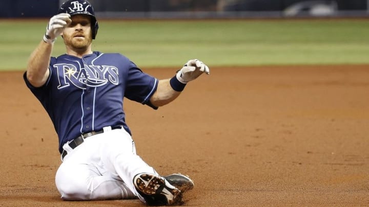 Jun 30, 2016; St. Petersburg, FL, USA;Tampa Bay Rays second baseman Logan Forsythe (11) slides into third as he doubles and advances on an error during the first inning at Tropicana Field. Mandatory Credit: Kim Klement-USA TODAY Sports