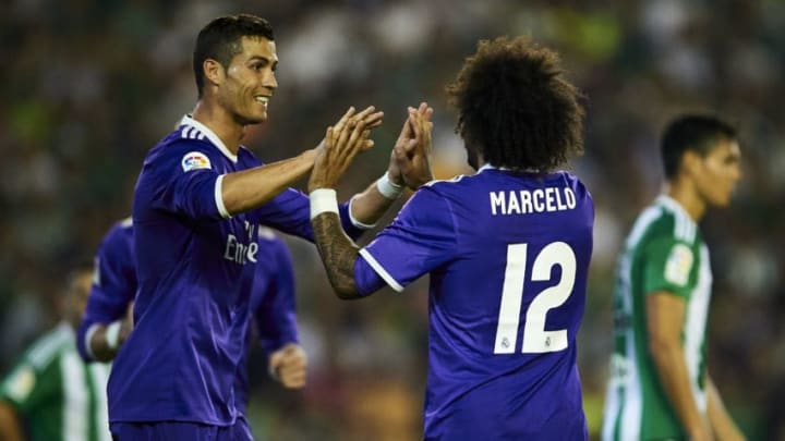 SEVILLE, SPAIN - OCTOBER 15: Marcelo (R) and Cristiano Ronaldo of Real Madrid CF celebrates after scoring during the match between Real Betis Balompie and Real Madrid CF as part of La Liga at Benito Villamrin stadium October 15, 2016 in Seville, Spain. (Photo by Aitor Alcalde/Getty Images)