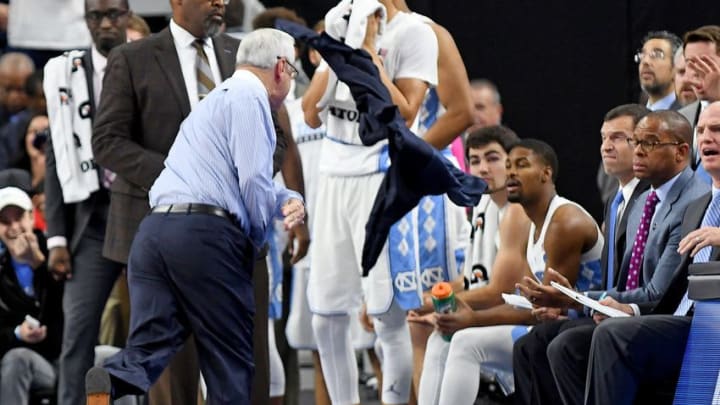 Dec 17, 2016; Las Vegas, NV, USA; North Carolina Tar Heels head coach Roy Williams throws his jacket in protest of a call on the floor during a game against the Kentucky Wildcats at T-Mobile Arena. Mandatory Credit: Stephen R. Sylvanie-USA TODAY Sports