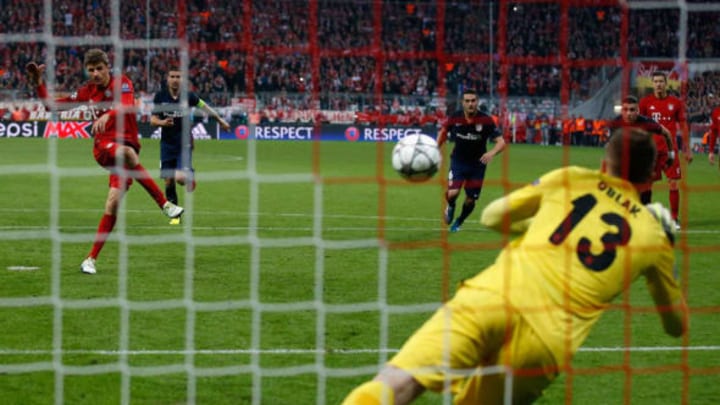 MUNICH, GERMANY – MAY 03: Goalkeeper Jan Oblak of Atletico Madrid saves a penalty of Thomas Mueller of Bayern Muenchen during UEFA Champions League semi final second leg match between FC Bayern Muenchen and Club Atletico de Madrid at Allianz Arena on May 3, 2016 in Munich, Germany. (Photo by Boris Streubel/Getty Images)