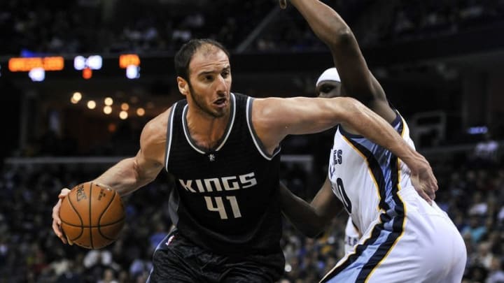 Dec 16, 2016; Memphis, TN, USA; Sacramento Kings center Kosta Koufos (41) handles the ball against Memphis Grizzlies forward Zach Randolph (50) during the second half at FedExForum. Sacramento Kings defeated the against the Memphis Grizzlies 96-92. Mandatory Credit: Justin Ford-USA TODAY Sports