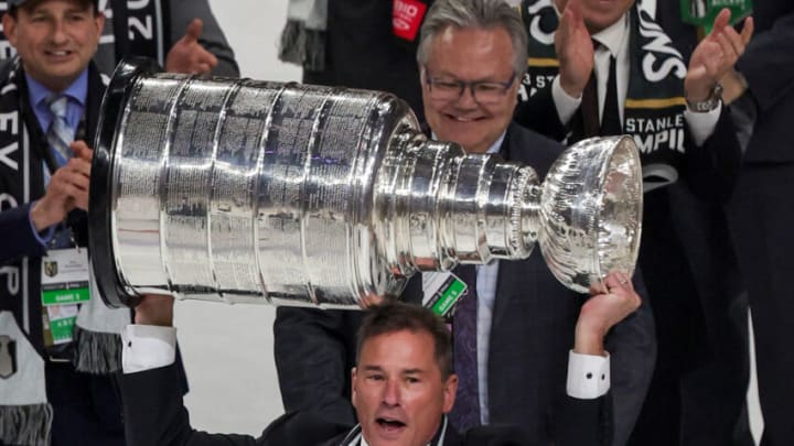 LAS VEGAS, NEVADA - JUNE 13: Head coach Bruce Cassidy of the Vegas Golden Knights hoists the Stanley Cup after the team's 9-3 victory over the Florida Panthers in Game Five of the 2023 NHL Stanley Cup Final at T-Mobile Arena on June 13, 2023 in Las Vegas, Nevada. The Golden Knights won the series four games to one. (Photo by Ethan Miller/Getty Images)
