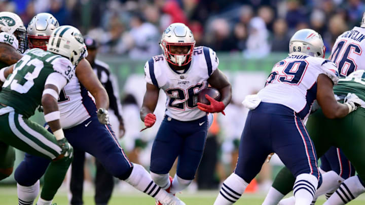 EAST RUTHERFORD, NEW JERSEY - NOVEMBER 25: Sony Michel #26 of the New England Patriots runs the ball against the New York Jets at MetLife Stadium on November 25, 2018 in East Rutherford, New Jersey. (Photo by Sarah Stier/Getty Images)