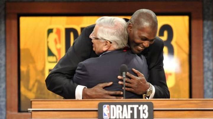 Jun 27, 2013; Brooklyn, NY, USA; NBA commissioner David Stern (front) gets a hug from former NBA player Hakeem Olajuwon after the first round of the 2013 NBA Draft at the Barclays Center. Mandatory Credit: Joe Camporeale-USA TODAY Sports Jun 27, 2013; Brooklyn, NY, USA; NBA commissioner David Stern (front) gets a hug from former NBA player Hakeem Olajuwon after the first round of the 2013 NBA Draft at the Barclays Center. Mandatory Credit: Joe Camporeale-USA TODAY Sports