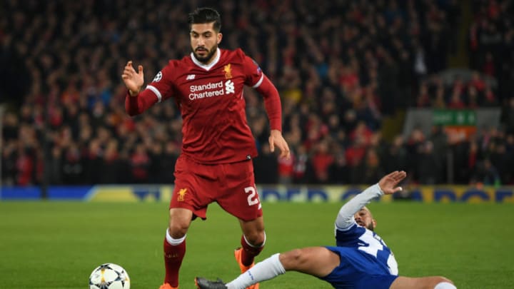 LIVERPOOL, ENGLAND - MARCH 06: Emre Can of Liverpool is tackled by Maximiliano of FC Porto during the UEFA Champions League Round of 16 Second Leg match between Liverpool and FC Porto at Anfield on March 6, 2018 in Liverpool, United Kingdom. (Photo by Shaun Botterill/Getty Images)