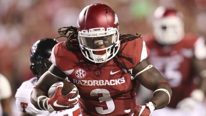Sep 19, 2015; Fayetteville, AR, USA; Arkansas Razorbacks running back Alex Collins (3) rushes in the fourth quarter against the Texas Tech Red Raiders at Donald W. Reynolds Razorback Stadium. Texas Tech defeated Arkansas 35-24. Mandatory Credit: Nelson Chenault-USA TODAY Sports