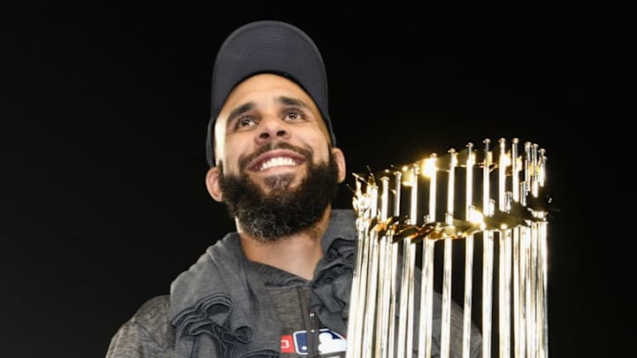 LOS ANGELES, CA - OCTOBER 28: David Prrice #24 of the Boston Red Sox celebrates with the World Series trophy after his team's 5-1 win over the Los Angeles Dodgers in Game Five to win the 2018 World Series at Dodger Stadium on October 28, 2018 in Los Angeles, California. (Photo by Harry How/Getty Images)