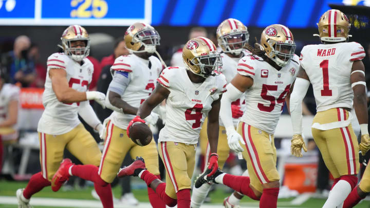 Jan 9, 2022; Inglewood, California, USA; San Francisco 49ers cornerback Emmanuel Moseley (4) celebrates with the ball against the Los Angeles Rams in the second half at SoFi Stadium. Mandatory Credit: Kirby Lee-USA TODAY Sports