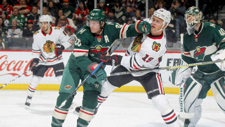 ST. PAUL, MN - FEBRUARY 10: Ryan Suter #20 of the Minnesota Wild and Jonathan Toews #19 of the Chicago Blackhawks battle for position during the game at the Xcel Energy Center on February 10, 2018 in St. Paul, Minnesota. (Photo by Bruce Kluckhohn/NHLI via Getty Images)