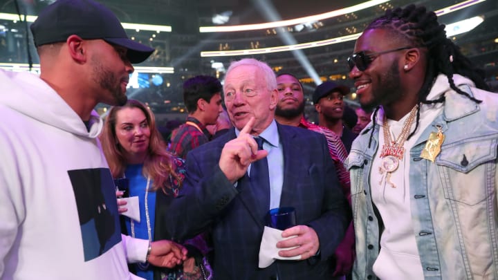 ARLINGTON, TEXAS – MARCH 16: Dallas Cowboys owner Jerry Jones talks with Dallas Cowboys quarterback Dak Prescott (L) and defensive end DeMarcus Lawrence before (R) Errol Spence Jr takes on Mikey Garcia in an IBF World Welterweight Championship bout at AT&T Stadium on March 16, 2019 in Arlington, Texas. (Photo by Tom Pennington/Getty Images)