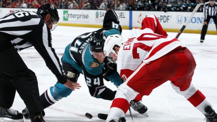 ANAHEIM, CA - OCTOBER 8: Carter Rowney #24 of the Anaheim Ducks battles in a face-off against Christoffer Ehn #70 of the Detroit Red Wings during the game on October 8, 2018 at Honda Center in Anaheim, California. (Photo by Debora Robinson/NHLI via Getty Images)