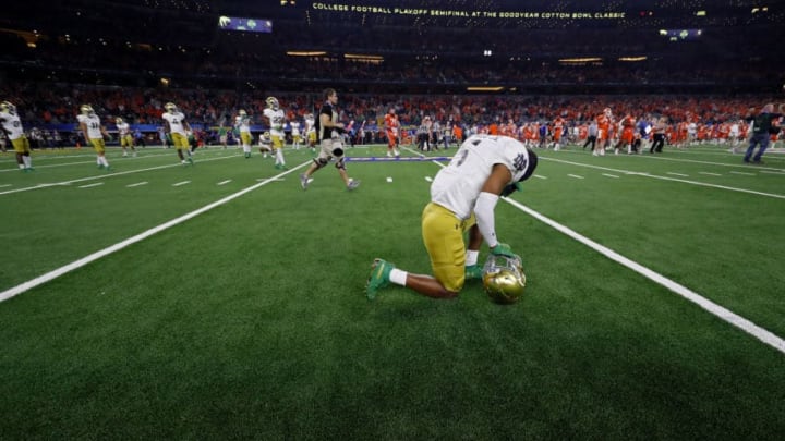 ARLINGTON, TEXAS - DECEMBER 29: Troy Pride Jr. #5 of the Notre Dame Fighting Irish reacts on the field after being defeated by the Clemson Tigers during the College Football Playoff Semifinal Goodyear Cotton Bowl Classic at AT&T Stadium on December 29, 2018 in Arlington, Texas. Clemson defeated Notre Dame 30-3. (Photo by Kevin C. Cox/Getty Images)